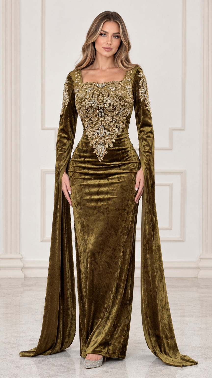 Front full view of woman wearing olive green embroidered velvet evening gown with flowing cape sleeves