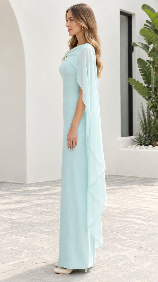 Side profile of Ice Blue floor-length evening dress with flowing cape