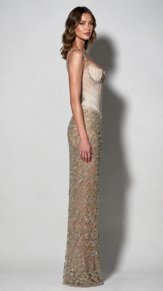 Side profile view of champagne beaded corset formal dress