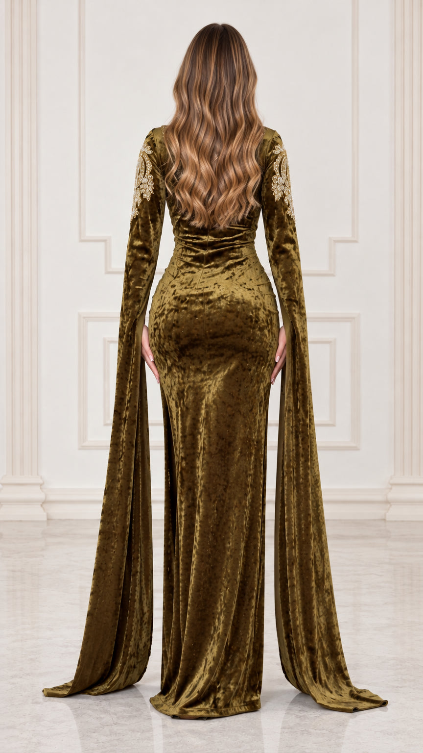 Back view of olive green velvet evening gown displaying floor-sweeping sleeves and streamlined fit