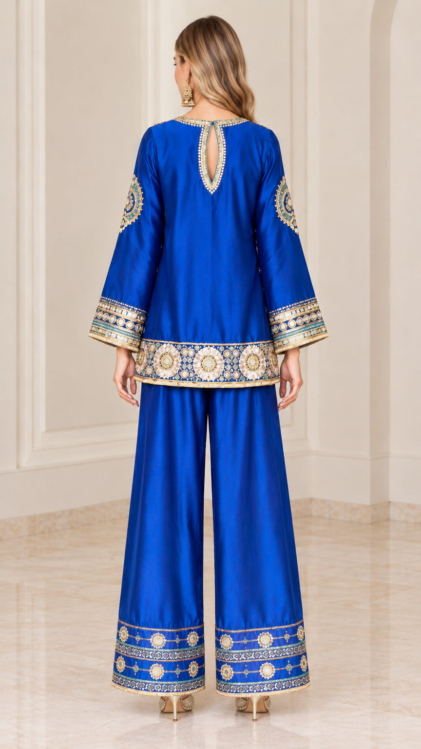 Back view of royal blue tunic top with keyhole closure and matching pants