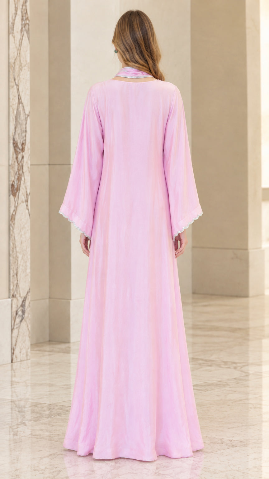 Back full view of woman wearing Light Pink floor length kaftan dress