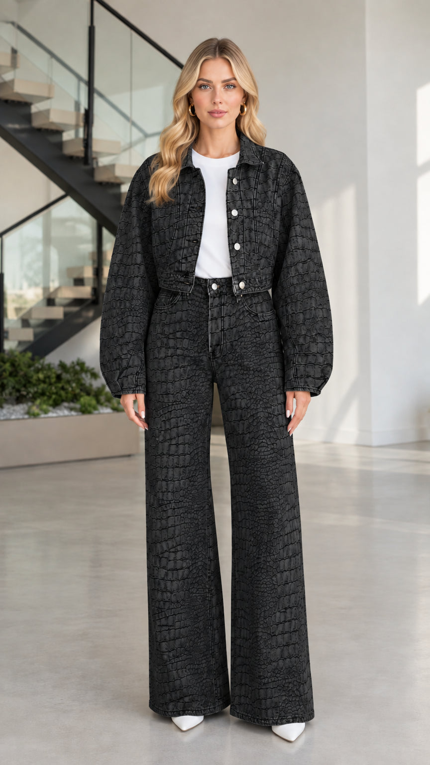 Full front view of model wearing Washed Black croc-embossed denim jacket and wide-leg pant set