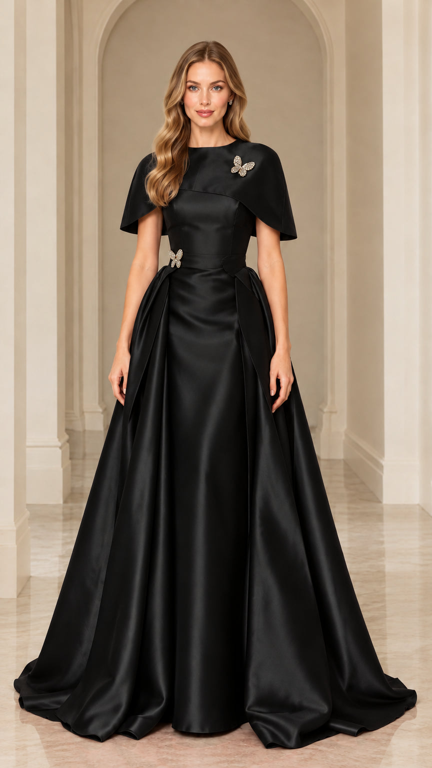 Black satin capelet evening gown with rhinestone butterfly accents