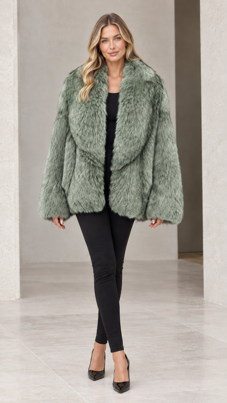Front view of woman wearing sage green plush faux fur coat
