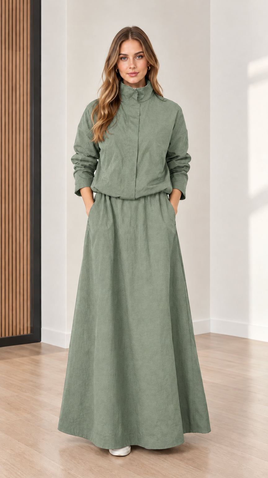 Front view of model wearing Sage Green stand collar elastic waist maxi dress