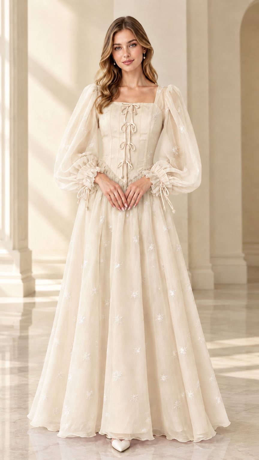 Front view of champagne cream square neck romantic fairy tale gown