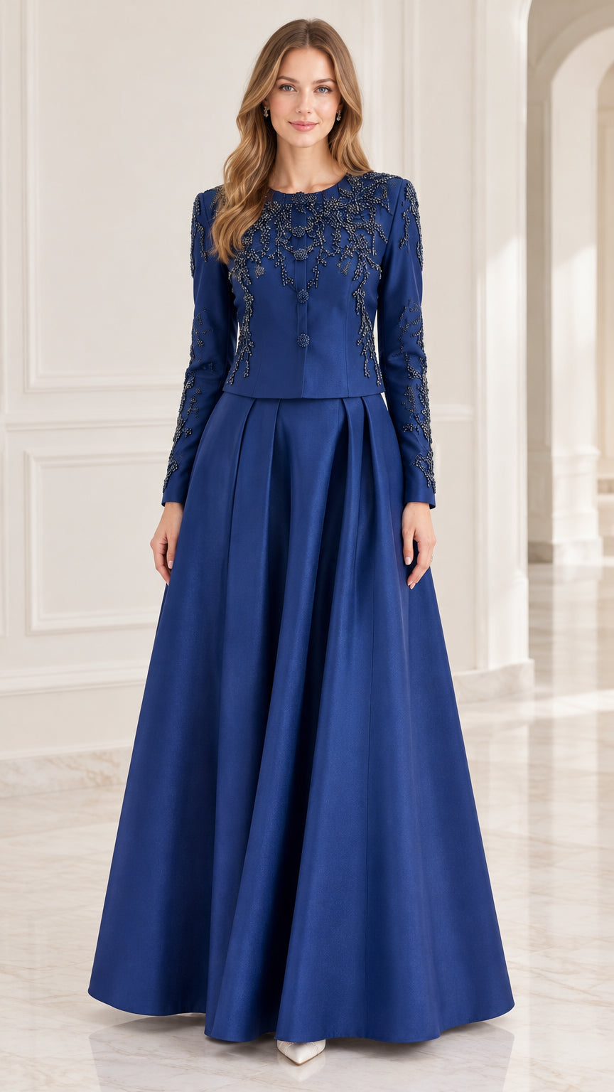 Front view of woman wearing royal blue long-sleeve beaded evening gown with pleated A-line skirt