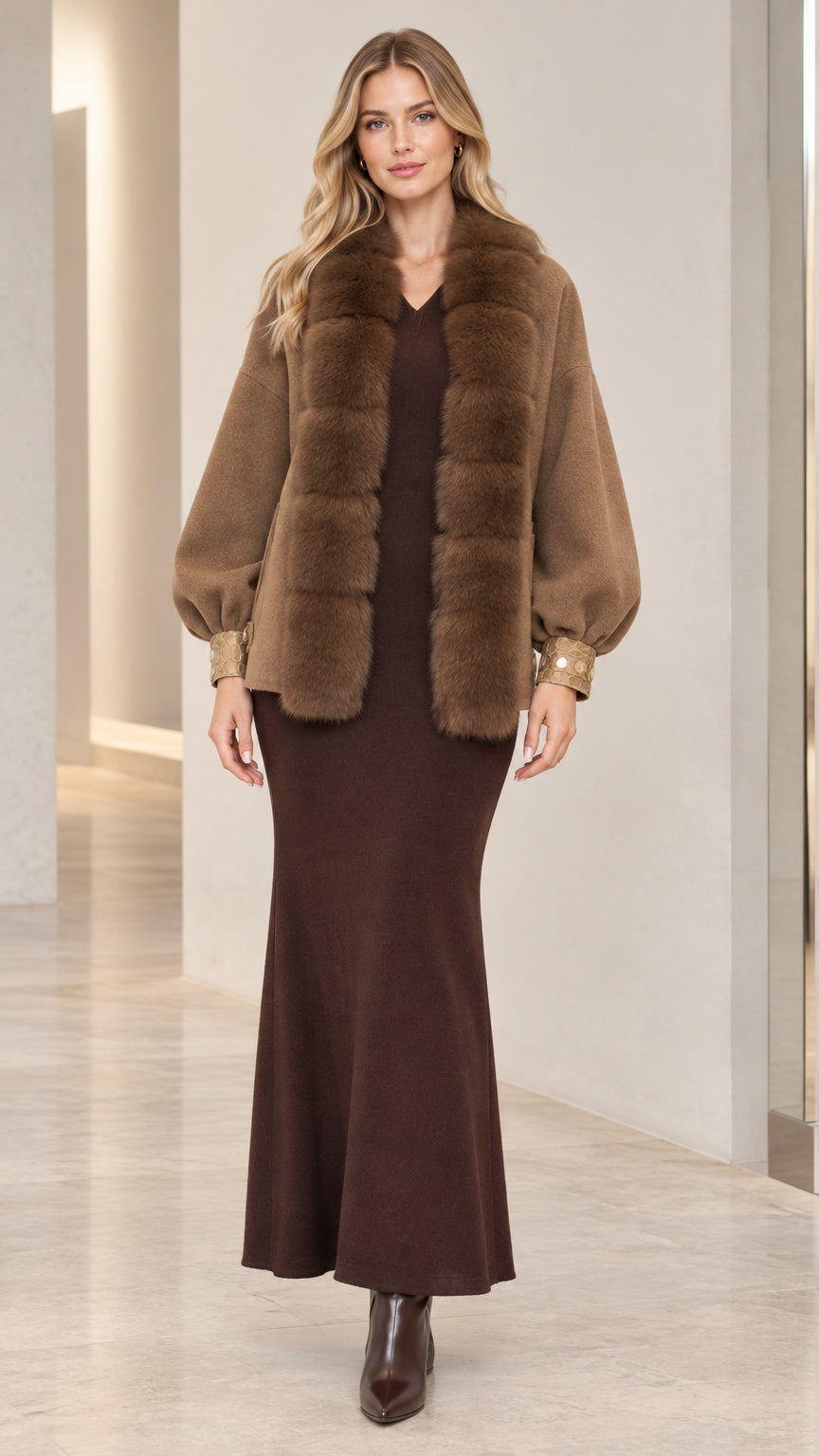 Front view of woman wearing camel faux fur trim short coat with maxi dress