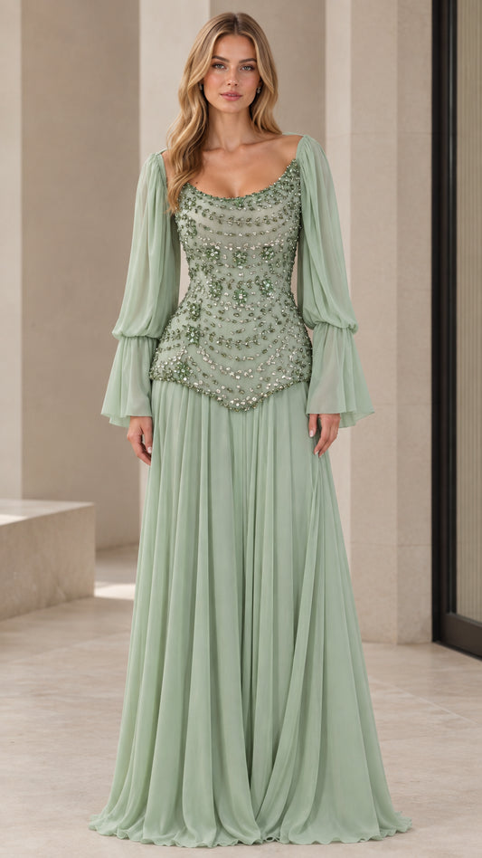 Front view of woman wearing a sage green beaded drop-waist chiffon evening gown with long bell sleeves