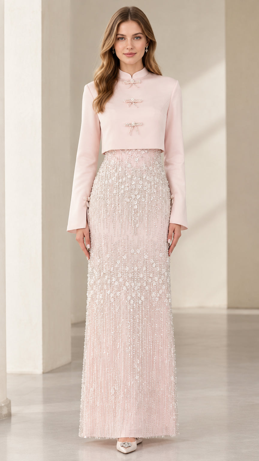 Model wearing Blush Pink Mandarin collar cropped jacket and beaded column maxi skirt front view