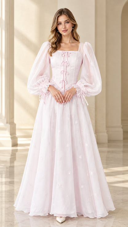 Front full view of light pink Renaissance corset maxi dress with sheer puff sleeves