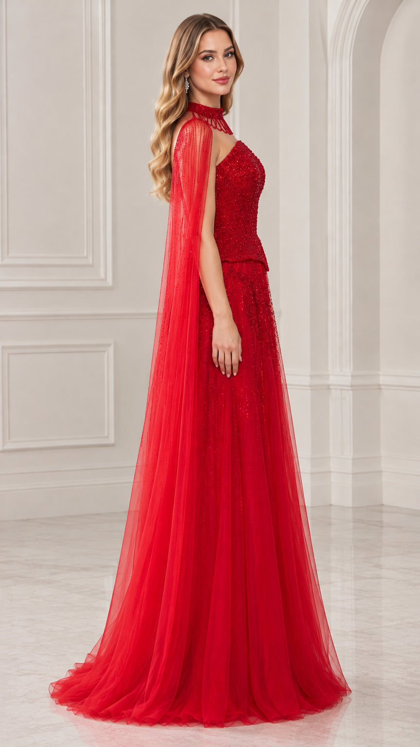 Side profile view of red formal cape gown showing sweeping tulle length