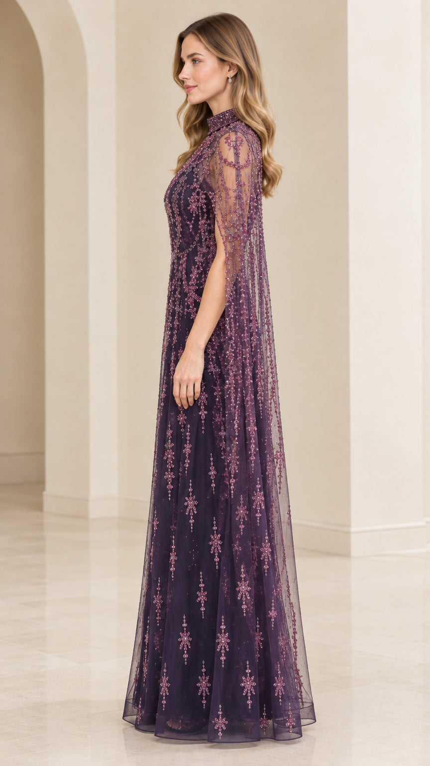 Side profile view of Deep Plum beaded evening gown showing flowing sheer cape silhouette