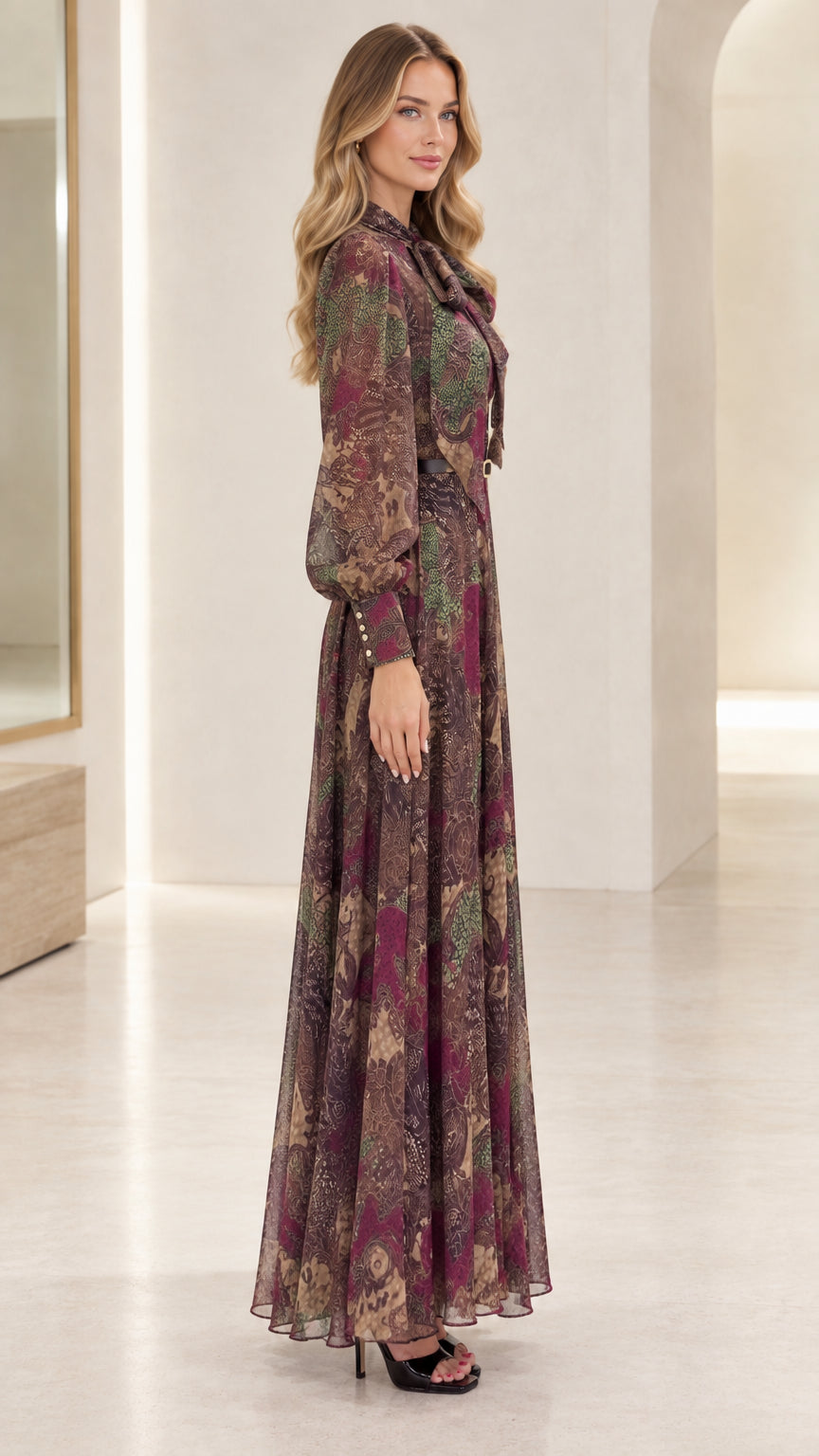 Side profile of woman in Plum Multi long-sleeve paisley maxi dress