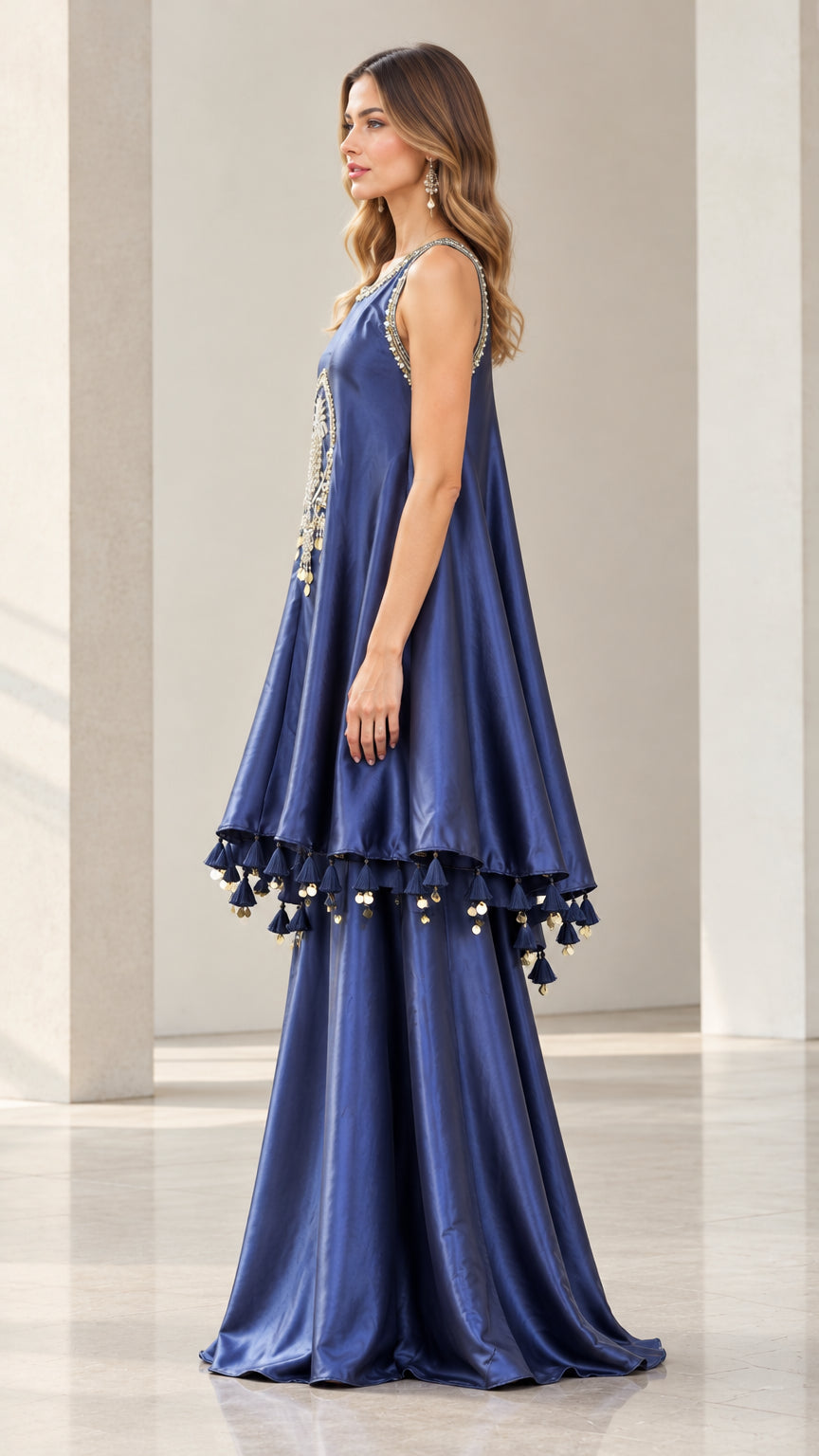 Side profile view of woman modeling the Navy Blue two-piece tunic and wide-leg pants outfit