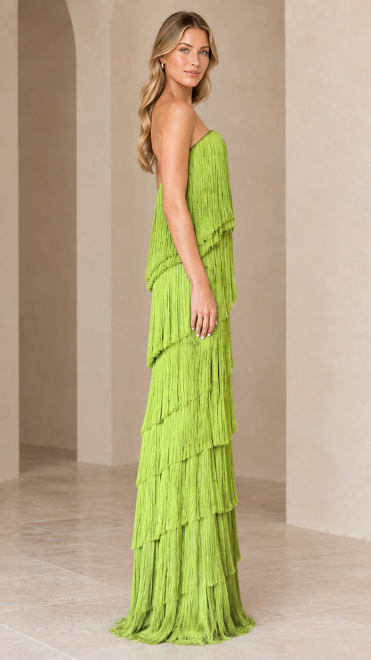 Side full-length view of lime green strapless fringe evening gown