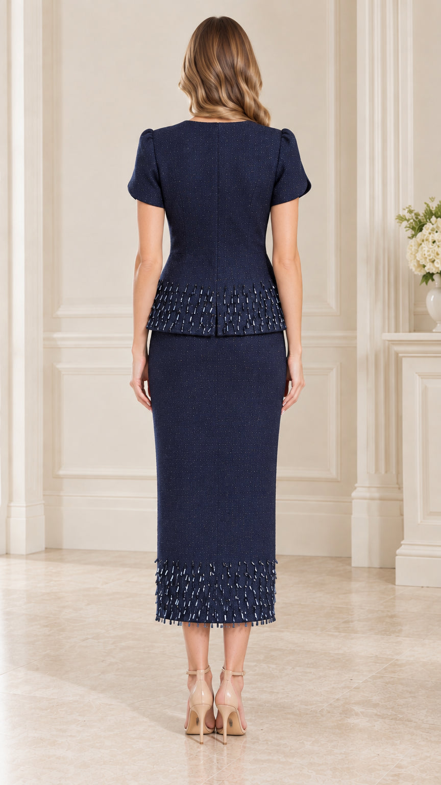 Back full-length view of navy blue tailored two-piece skirt suit set