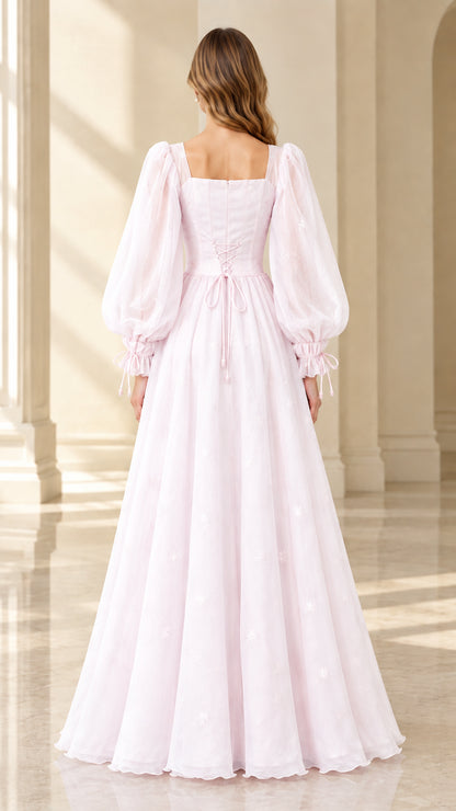 Back view of light pink square neck corset gown with lace-up detail