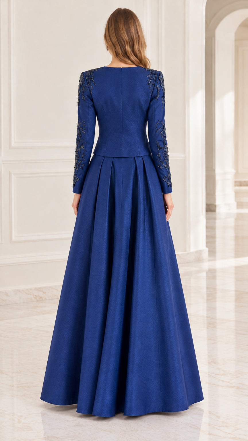 Back view of woman in royal blue floor-length formal evening gown