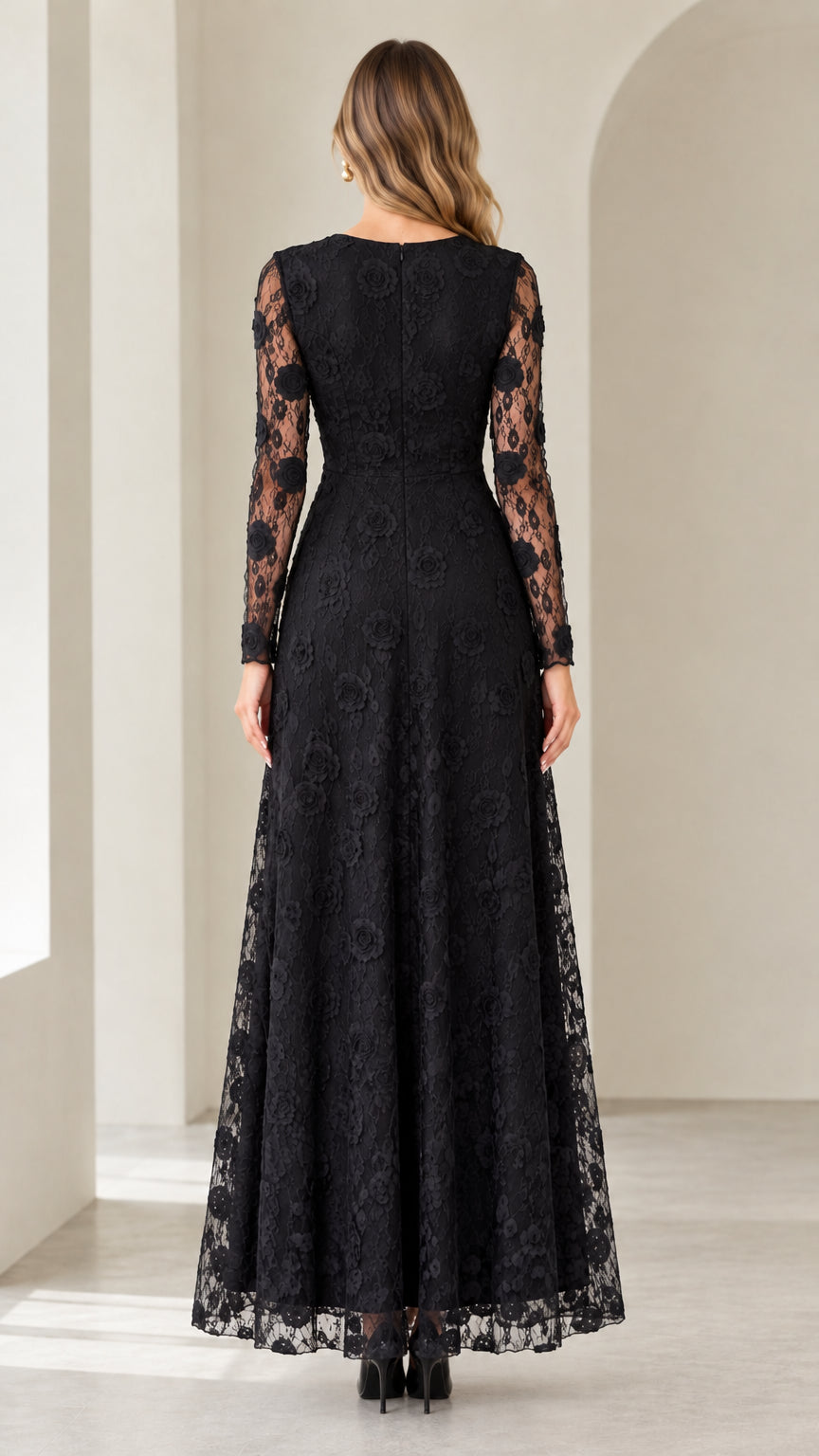 Back view of woman wearing black floral lace maxi dress with zipper back