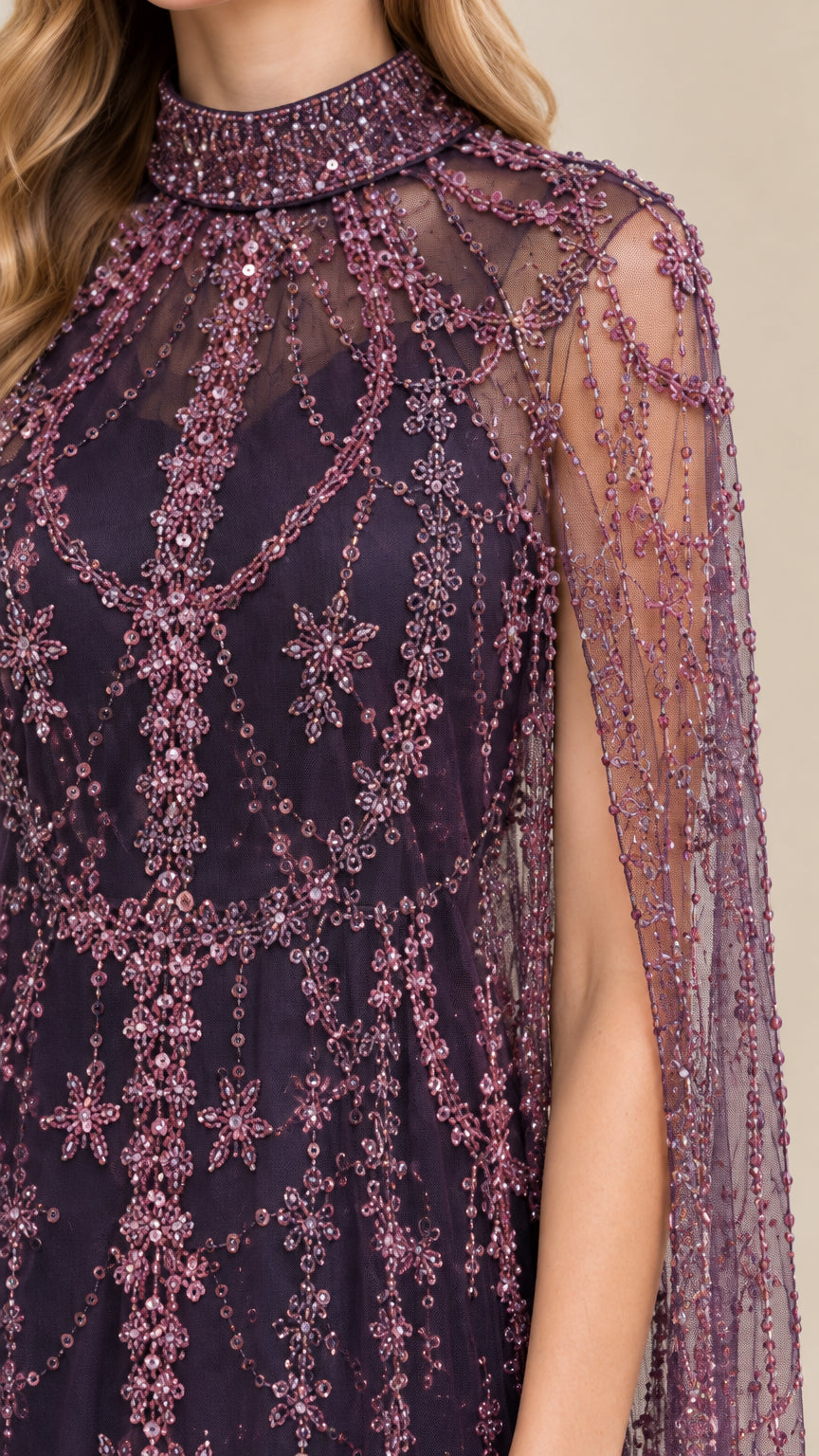 Close-up detail of high beaded neckline and delicate sequin embroidery on mesh cape