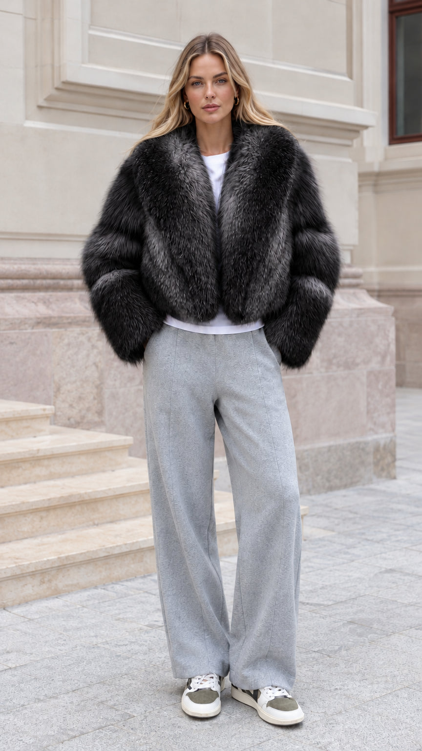 Model wearing Charcoal Black cropped faux fur jacket
