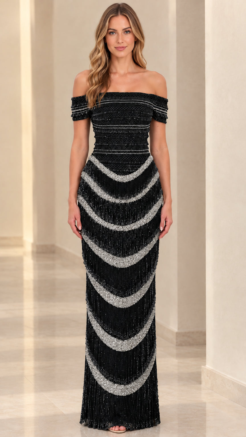 Front view of black off-the-shoulder evening gown with silver beaded fringe