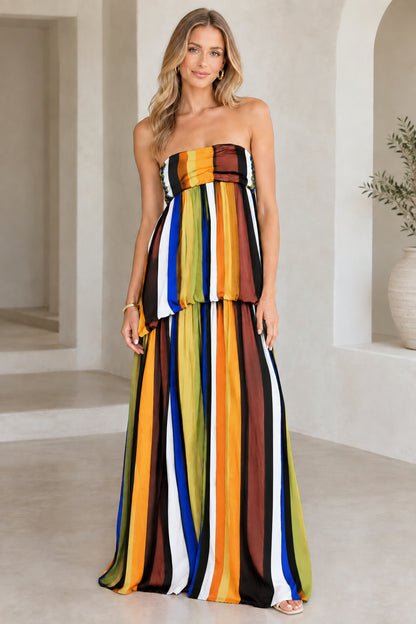 Model wearing black multicolor strapless striped maxi dress