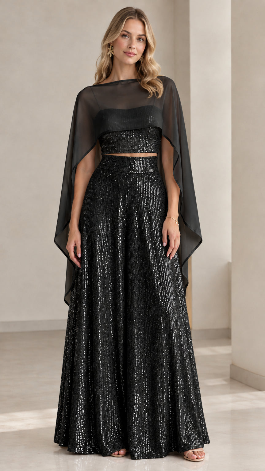 Black sequin crop top and wide leg pants set with black sheer capelet