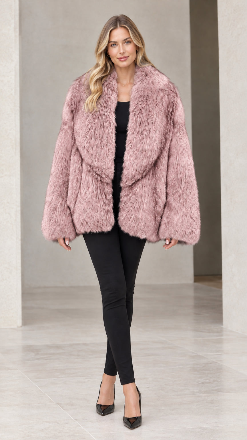 Front view of woman wearing dusty rose pink faux fur coat