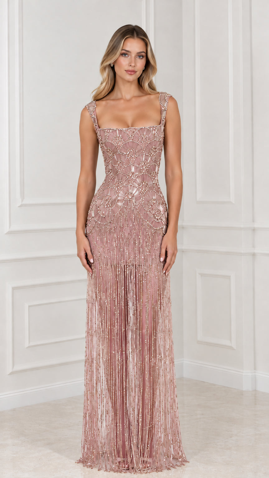 Front view of blush pink beaded fringe maxi formal dress