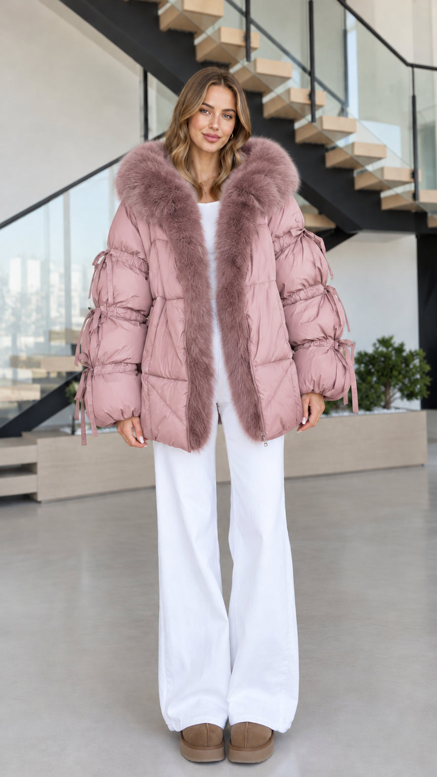 Women's dusty pink hooded puffer jacket with matching plush faux fur trim