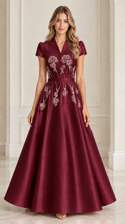 Front view of model wearing Burgundy satin beaded evening gown