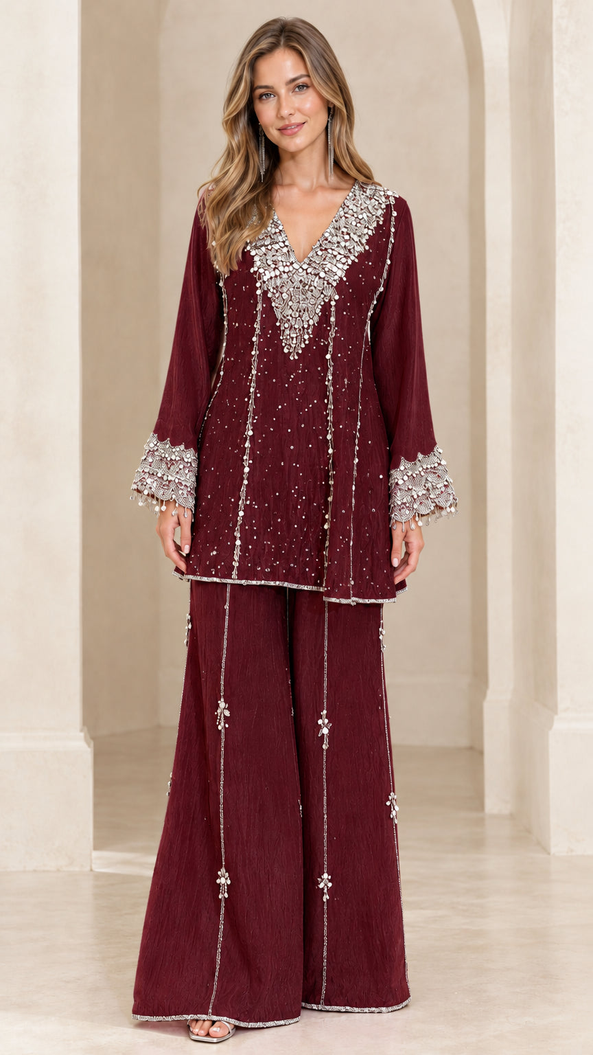 Front view of burgundy wine red embellished tunic and wide-leg pant set