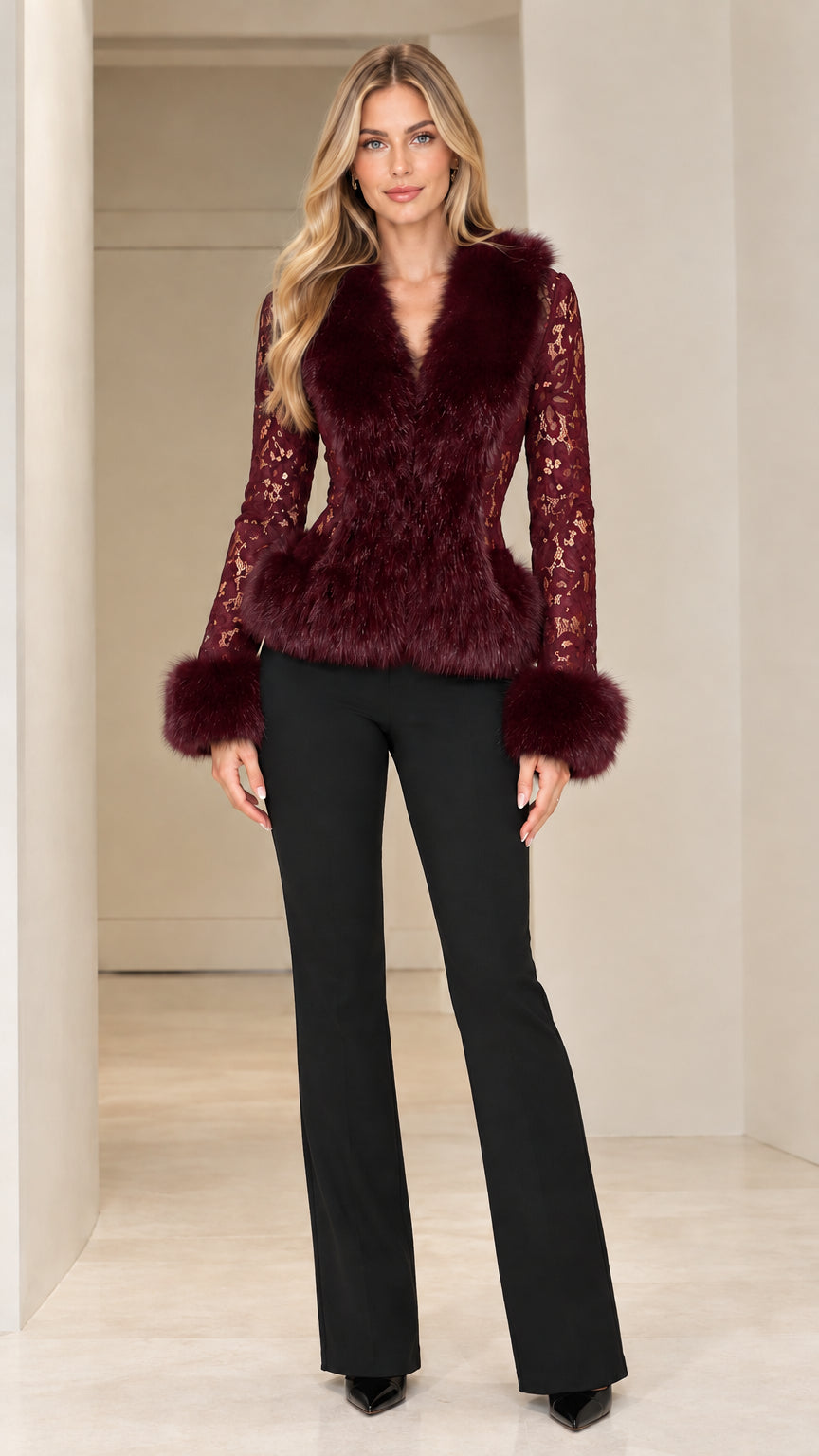 Full-length view of model wearing burgundy lace peplum jacket with wine red faux fur trim