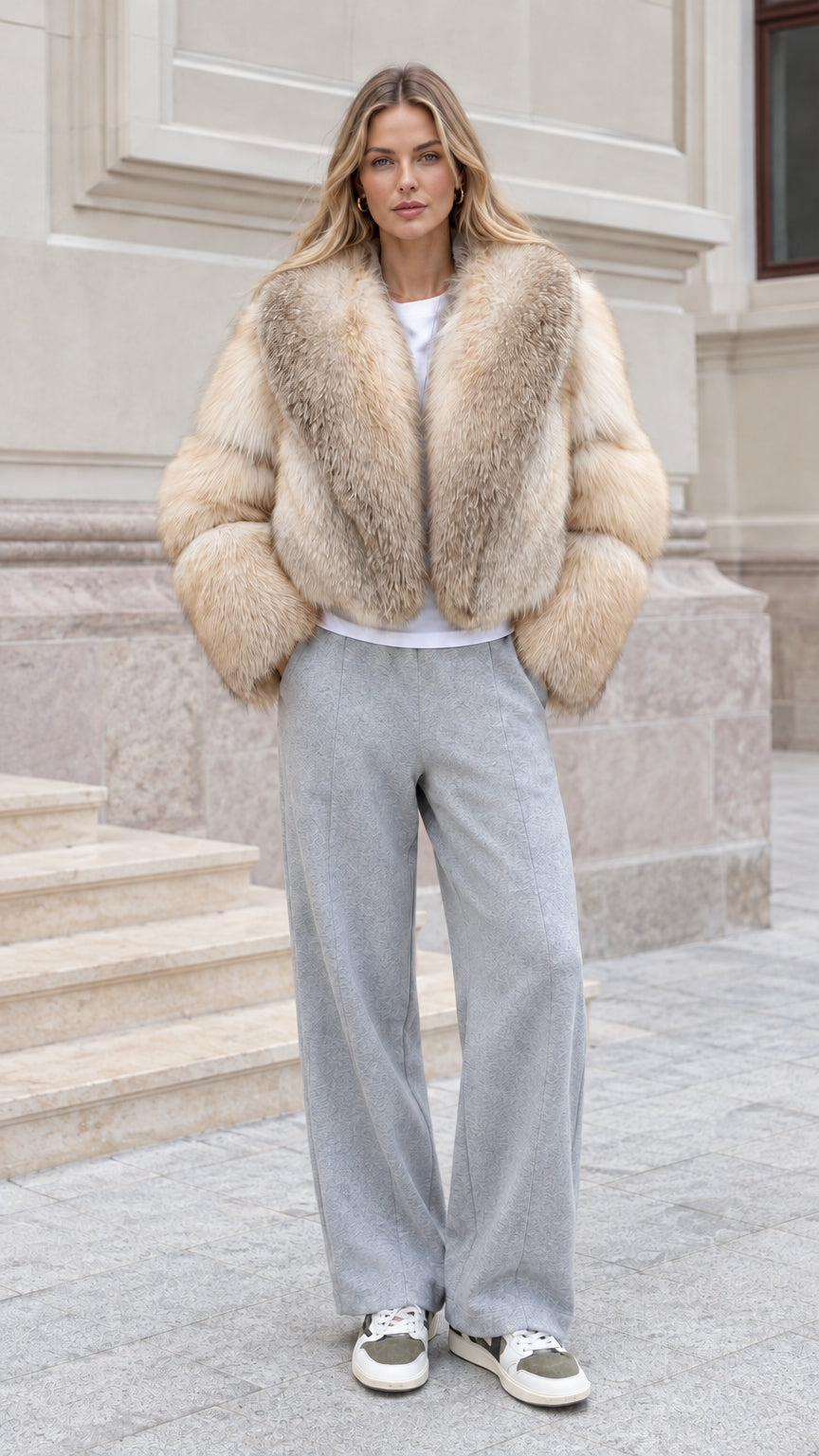 Model wearing Cream Beige cropped faux fur jacket