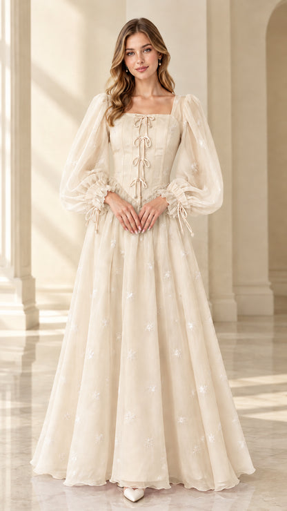 Front view of champagne cream square neck romantic fairy tale gown
