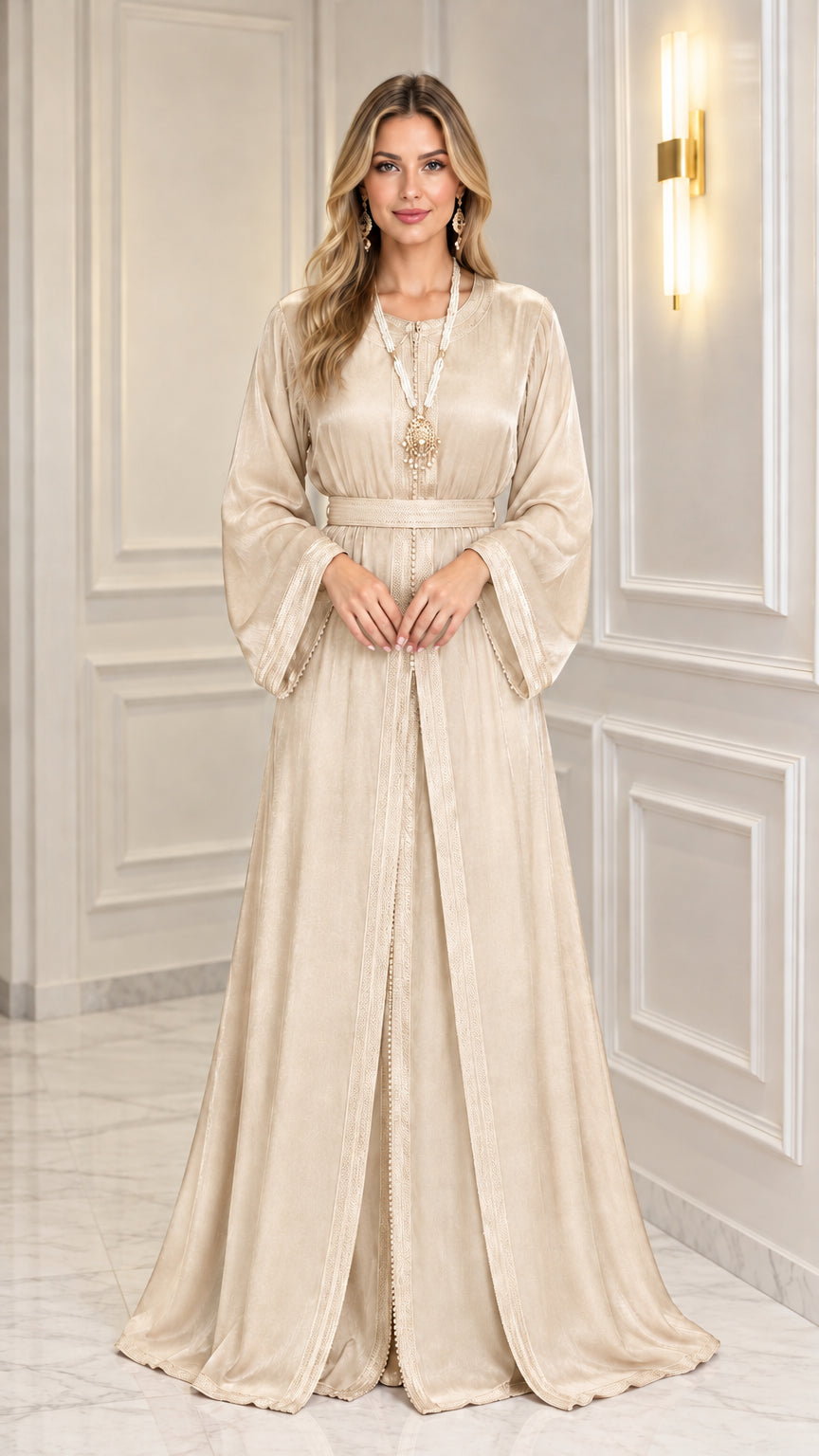 Front view of woman wearing Champagne beige satin belted kaftan dress