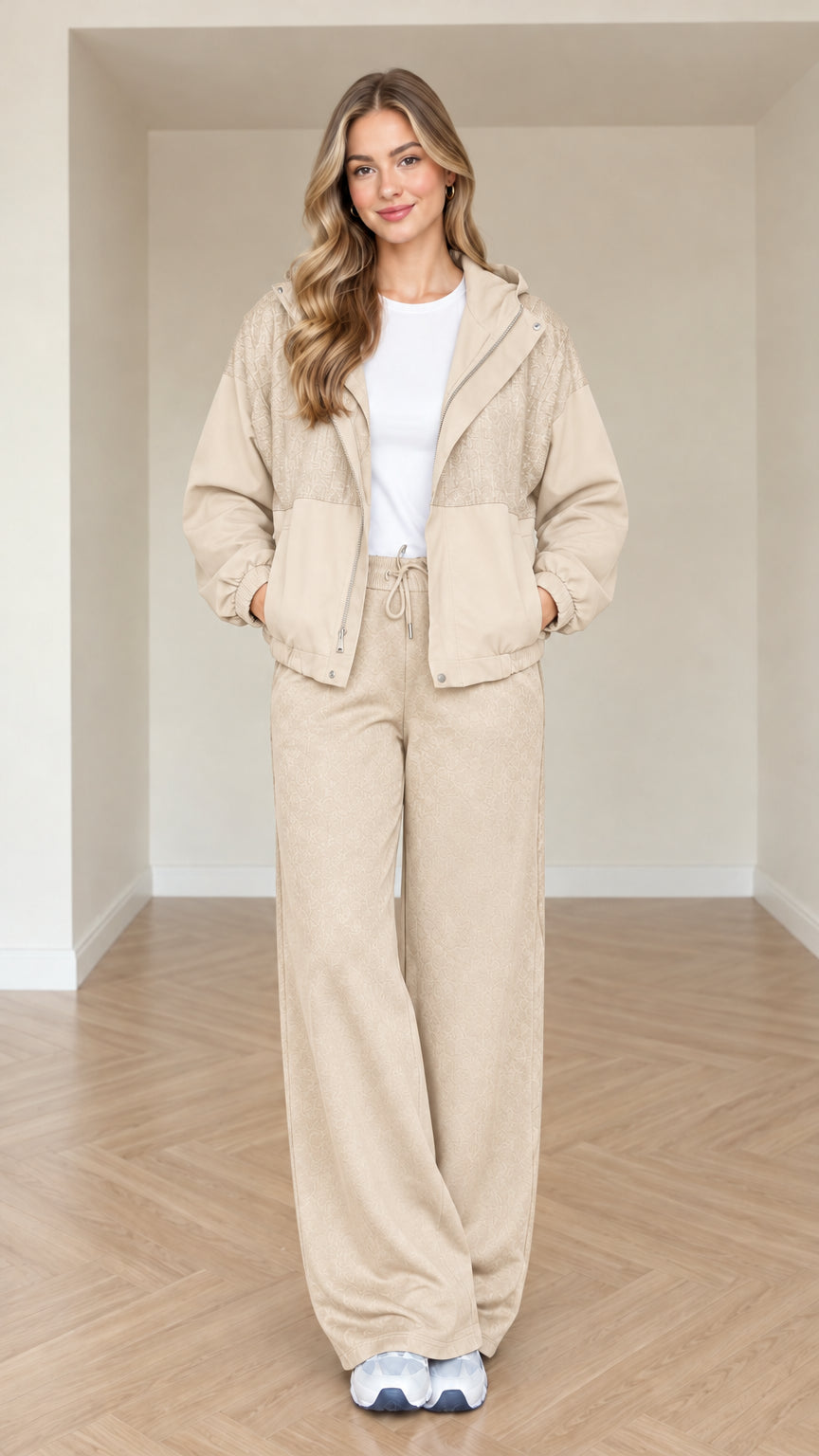 Model wearing beige women's casual two-piece tracksuit set with hood